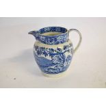 Late 18th or early 19th century blue and white printed water jug, printed with farmland scenes