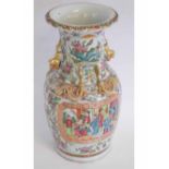 19th century famille rose large bulbous vase, decorated in typical manner with raised gilded dragons