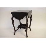 Edwardian mahogany square topped side table with four drop leaves, with decorative shaped legs