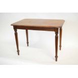 Rectangular mahogany formed side table supported on four turned legs, 74cms wide x 48cms deep x