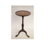 Edwardian mahogany wine table with satinwood inlaid top, with turned column supported on a tripod