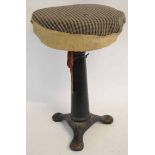 Cast iron based Singer adjustable industrial stool with a three-footed base, with a replacement