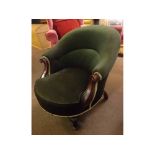 19th century mahogany green Dralon upholstered nursing chair with scrolling arms on half-fluted