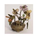 Early 20th century soapstone/composition flower arrangement, 12cms high