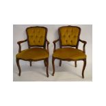 Pair of 20th century yellow Dralon upholstered armchairs, with cabriole front legs and button back