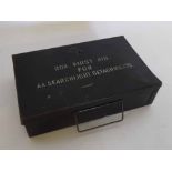 Mid-20th century Govt issue First Aid box of black painted metal hinged rectangular form, the lid