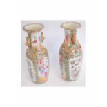 Pair of 19th century famille rose vases with decorative painted panels of figural and exotic bird