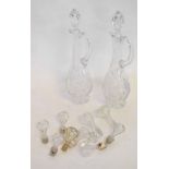 Pair of clear cut glass ewers with matching stoppers together with a further box containing mixed