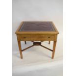 Reproduction mahogany side table fitted with single drawer with brass button handles and red leather