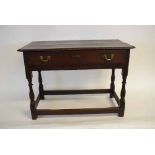 18th century oak framed single drawer side table on turned legs with brass swan neck handles, wit