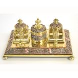 Victorian copper and brass ink stand with two fitted square cut inkwells with fitted lids,