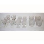 Set of four good quality lead crystal whisky tumblers with faceted bodies, together with a further