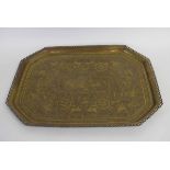 Extremely large Indian etched brass tray with circular pierced surround, with an etched design of