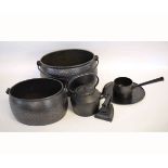 Two oval cast iron swing handled cooking pots, a further cast iron kettle and flat iron (qty)