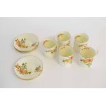 Five Royal Doulton Rosslyn coffee cans, floral decorated,