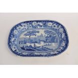 19th century blue and white printed platter with central bridged river scene, with sheep grazing