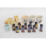 Box containing three Sooty children's mugs, further six egg cups and a group of Robinsons band