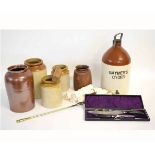 Gaymers Cider flagon, together with four assorted stoneware pots, a horn handled cased three-piece
