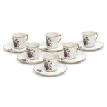 Six coffee cups and saucers, marked "Le Tallec, Paris", with the code BB for 1954, fire brigade