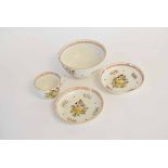 Late 18th or early 19th century part tea set with painted panels of a shell among foliage,