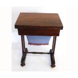 William IV walnut fold-over sewing table with inlaid leather, with open work planked ends raised