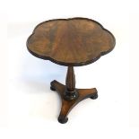 William IV mahogany and rosewood clover top wine table with reeded column on a tripod base raised on