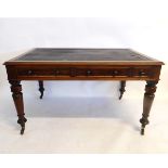 Victorian mahogany desk with brown leather insert, fitted with three drawers with turned knob