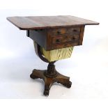 William IV pedestal drop leaf sewing table fitted with two drawers with a carved column on a