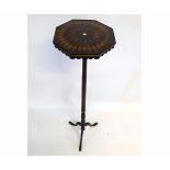 Georgian mahogany candle stand with star burst marquetry hexagonal top on a turned column and a