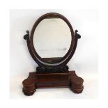 Victorian mahogany dressing table mirror with oval mirror and carved supports, with two fitted wells