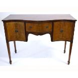 George III style serpentine fronted sideboard, fitted centrally with single drawer, flanked either