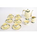 Old Hall ivory coffee wares with raised floral border comprising six coffee cans and saucers,