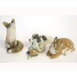 Three Royal Copenhagen models: Fox, Retriever dog, Deer, various sizes