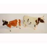 Two Beswick cattle: Champion White Hill Mandate and Champion Ickham Bessie (losses), 13cms and 12cms