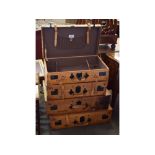 Good quality tan leather graduated set of four decorative suitcases by Giovanni with brown lined