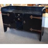 Art Nouveau stylised ebonised oak sideboard fitted centrally with two cupboard doors with open