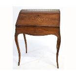 19th century French walnut bureau with brass galleried back with floral marquetry inlaid panel on