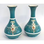 Pair of 19th century blue decorative French green and white glazed lamp bases with painted cameo