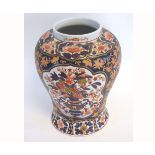 Late 20th century large Imari decorated vase, with decorative floral panels and blue ground, 35cms