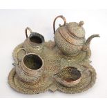 Middle Eastern coppered five-piece tea set with a cast and pierced clover formed tray (5)