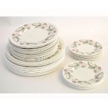 Group containing three varying sized Susie Cooper raspberry decorated plates comprising 10 27cms