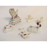 Three 19th century Staffordshire dogs to include two miniature lion dogs, a further free-standing