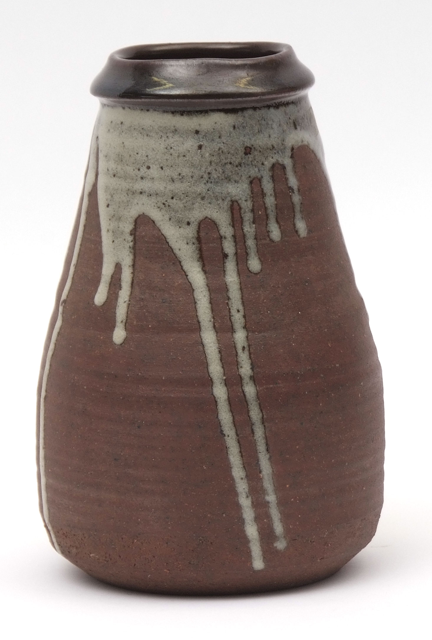 St Ives Studio pottery vase by Janet Leech, the ribbed baluster body with a white trail slip design,