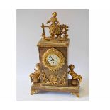 Late 20th century brown alabaster? and gilt finished quartz mantel clock, the plinth shaped case