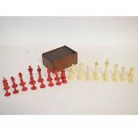 Collection of Redstone and bone Chess pieces of Staunton pattern