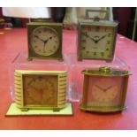 Mixed Lot: comprising four various alarm clocks and timepieces including Zenith, JAZ, Smith's and