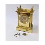 Late 19th century French lacquered brass mantel clock, the plinth shaped case with galleried