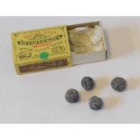 Four lead musket balls retained within a Bryant & May matchbox