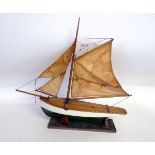 Early 20th century scratch made model boat, the "Abo", attached note reads "The Abo belonging to the