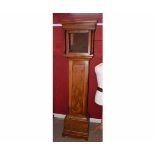 Early 19th century elm longcase clock case, with moulded overhanging cornice, plain frieze, free-